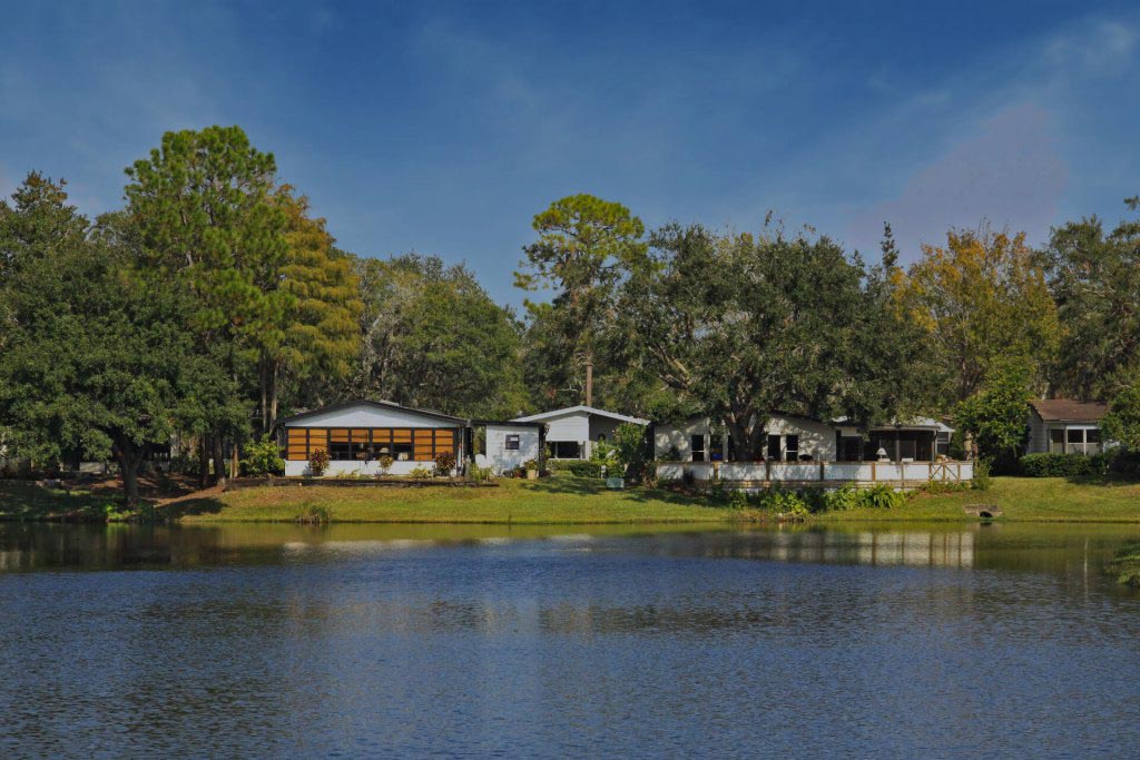 mobile homes along the community lake